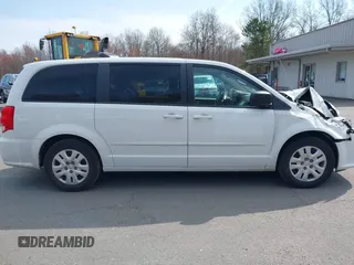 2015 Dodge Grand Caravan SE with VIN 2C4RDGBG6FR613981, listed as a IAAI auction lot 42043348 with 87,615 mi miles and . Bid and sale history available at DreamBid. Image 13.