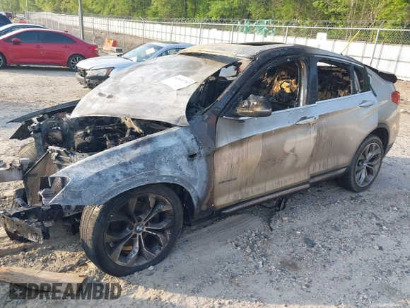 2015 BMW X4 xDrive28i with VIN 5UXXW3C54F0M88902, listed as a IAAI auction lot 42037787 with Not provided miles and . Bid and sale history available at DreamBid. Image 2.