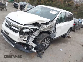 2019 Honda Pilot EX-L with VIN 5FNYF6H59KB075577, listed as a IAAI auction lot 41863841 with 102,242 mi miles and . Bid and sale history available at carsss.com. Image 2.