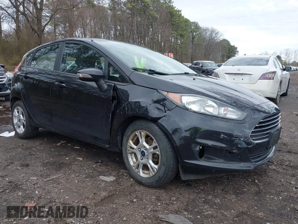 2015 Ford Fiesta SE with VIN 3FADP4EJ9FM175123, listed as a IAAI auction lot 41948452 with 130,801 mi miles. Bid and sale history available at carsss.com. Image 6.