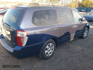 2006 Kia Sedona LX with VIN KNDMB233266051437, listed as a IAAI auction lot 41760622 with 999,999 mi miles. Bid and sale history available at carsss.com. Image 4.