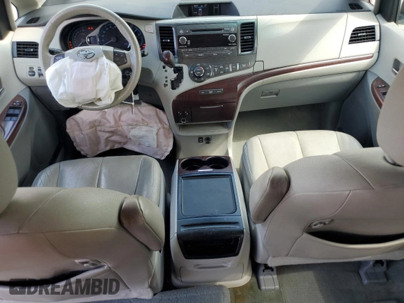 2012 Toyota Sienna XLE AAS with VIN 5TDYK3DC1CS233762, listed as a Copart auction lot 59224495 with 116,155 mi miles and Salvage title. Bid and sale history available at DreamBid. Image 8.