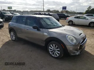 2017 MINI Clubman Cooper S with VIN WMWLU5C36H2E83921, listed as a Copart auction lot 79326784 with 133,564 mi miles and Salvage Title. Bid and sale history available at carsss.com. Image 4.