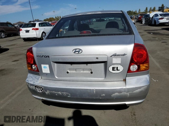 2003 Hyundai Accent GL with VIN KMHCG45CX3U488238, listed as a Copart auction lot 74399014 with 130,915 mi miles and Clean Title. Bid and sale history available at carsss.com. Image 6.