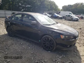 2009 Mitsubishi Lancer GTS with VIN JA3AU86W89U003672, listed as a Copart auction lot 74672874 with 184,000 mi miles and Salvage Title. Bid and sale history available at carsss.com. Image 4.