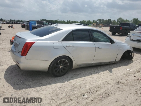 2014 Cadillac CTS AWD with VIN 1G6AW5SX4E0123532, listed as a Copart auction lot 55389825 with 114,807 mi miles and Salvage title. Bid and sale history available at DreamBid. Image 3.