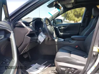 2021 Toyota RAV4 Hybrid XSE with VIN 2T3E6RFVXMW016803, listed as a IAAI auction lot 42135617 with 40,898 mi miles and . Bid and sale history available at DreamBid. Image 5.