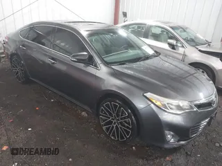 2015 Toyota Avalon Limited with VIN 4T1BK1EB6FU164773, listed as a IAAI auction lot 41877742 with 128,858 mi miles and . Bid and sale history available at carsss.com. Image 1.