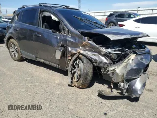 2018 Toyota RAV4 XLE with VIN JTMWFREV6JJ172451, listed as a Copart auction lot 58095775 with Not provided miles and Salvage title. Bid and sale history available at DreamBid. Image 4.