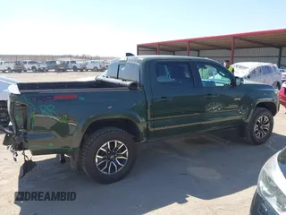2022 Toyota Tacoma SR with VIN 3TMCZ5AN0NM470396, listed as a IAAI auction lot 41909515 with 35,997 mi miles and . Bid and sale history available at DreamBid. Image 14.