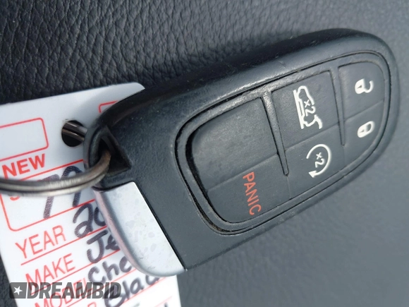 2015 Jeep Cherokee Trailhawk with VIN 1C4PJMBS5FW647601, listed as a IAAI auction lot 42437734 with 170,640 mi miles and . Bid and sale history available at DreamBid. Image 11.