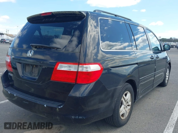 2006 Honda Odyssey EX-L z VIN 5FNRL387X6B055048, wystawiony jako IAAI lot #41974961 z przebiegiem 123 361 mil mil oraz . Historia ofert i sprzedaży dostępna na DreamBid. Obrazek 4.