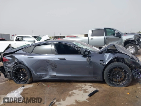 2021 Tesla Model S Plaid z VIN 5YJSA1E6XMF429436, wystawiony jako IAAI lot #41826114 z przebiegiem Nie podano mil oraz . Historia ofert i sprzedaży dostępna na DreamBid. Obrazek 13.