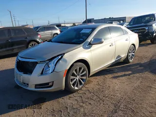 2014 Cadillac XTS with VIN 2G61L5S30E9207777, listed as a IAAI auction lot 41202654 with 112,565 mi miles. Bid and sale history available at carsss.com. Image 17.