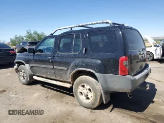 2001 Nissan Xterra XE with VIN 5N1ED28T01C522269, listed as a Copart auction lot 56997515 with 103,800 mi miles and Salvage title. Bid and sale history available at DreamBid. Image 2.