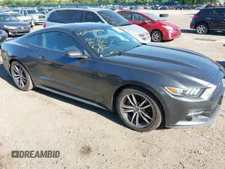 2016 Ford Mustang EcoBoost z VIN 1FA6P8TH4G5241245, wystawiony jako IAAI lot #42276819 z przebiegiem 80 190 mil mil oraz . Historia ofert i sprzedaży dostępna na DreamBid. Obrazek 1.
