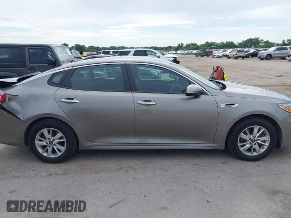 2016 Kia Optima LX with VIN 5XXGT4L37GG019897, listed as a IAAI auction lot 42582213 with 90,318 mi miles and . Bid and sale history available at DreamBid. Image 13.
