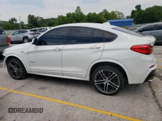 2015 BMW X4 xDrive28i with VIN 5UXXW3C54F0M89077, listed as a Copart auction lot 62282333 with 126,467 mi miles. Bid and sale history available at carsss.com. Image 2.