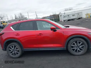2018 Mazda CX-5 Grand Touring with VIN JM3KFBDM0J0427753, listed as a IAAI auction lot 41740838 with 69,683 mi miles and . Bid and sale history available at DreamBid. Image 13.