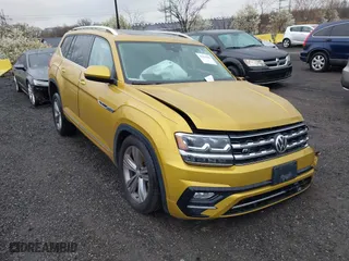 2018 Volkswagen Atlas 3.6L V6 SEL with VIN 1V2RR2CA0JC557938, listed as a IAAI auction lot 41964285 with 53,991 mi miles. Bid and sale history available at carsss.com. Image 1.