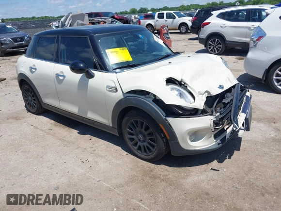 2016 MINI Hardtop 4 Door z VIN WMWXU1C50G2D08848, wystawiony jako IAAI lot #42215256 z przebiegiem 102 643 mil mil oraz . Historia ofert i sprzedaży dostępna na DreamBid. Obrazek 1.