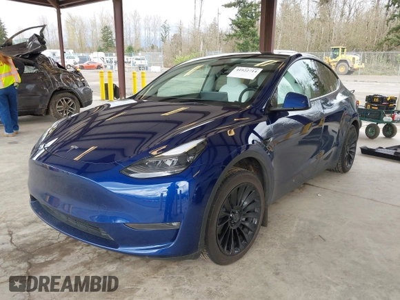 2023 Tesla Model Y Long Range with VIN 7SAYGDEEXPF621397, listed as a IAAI auction lot 41922714 with 29,460 mi miles. Bid and sale history available at carsss.com. Image 2.