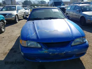 1998 Ford Mustang with VIN 1FAFP4448WF236496, listed as a IAAI auction lot 41408520 with 151,935 mi miles. Bid and sale history available at carsss.com. Image 12.