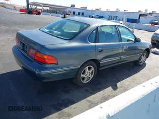 1998 Toyota Avalon XL with VIN 4T1BF18BXWU267131, listed as a IAAI auction lot 41518513 with 208,023 mi miles and . Bid and sale history available at DreamBid. Image 4.