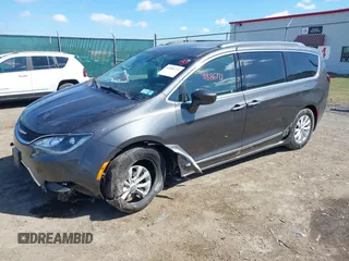 2018 Chrysler Pacifica Touring L with VIN 2C4RC1BGXJR356199, listed as a IAAI auction lot 41886721 with 111,514 mi miles and . Bid and sale history available at DreamBid. Image 2.