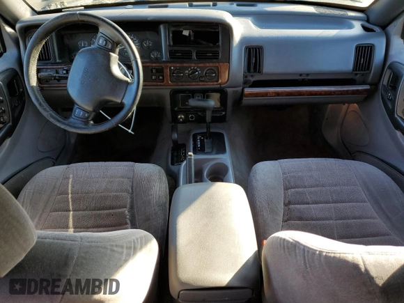 1998 Jeep Grand Cherokee Laredo with VIN 1J4GZ58S0WC106148, listed as a Copart auction lot 42855105 with 263,785 mi miles and Salvage Title. Bid and sale history available at carsss.com. Image 8.
