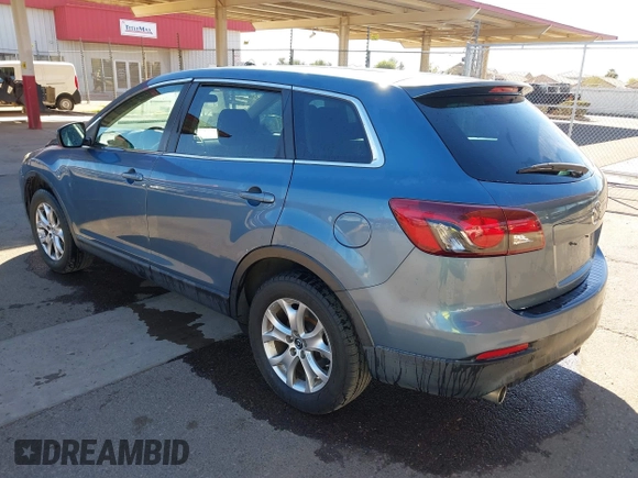 2014 Mazda CX-9 Sport with VIN JM3TB3BA5E0427753, listed as a IAAI auction lot 41679267 with 135,993 mi miles and . Bid and sale history available at DreamBid. Image 3.