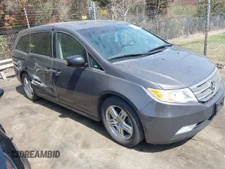 2012 Honda Odyssey Touring с VIN 5FNRL5H92CB116899, выставлен на аукционе IAAI как лот 41907863 с пробегом 225 221 миль миль и . История ставок и продаж доступна на DreamBid. Изображение 1.