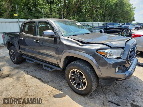 2017 Toyota Tacoma SR5 with VIN 3TMAZ5CNXHM044286, listed as a Copart auction lot 61455145 with 112,079 mi miles and Salvage title. Bid and sale history available at DreamBid. Image 4.