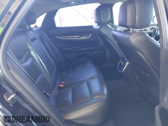 2013 Cadillac XTS Luxury with VIN 2G61P5S35D9105460, listed as a IAAI auction lot 42582313 with 144,895 mi miles and . Bid and sale history available at DreamBid. Image 8.