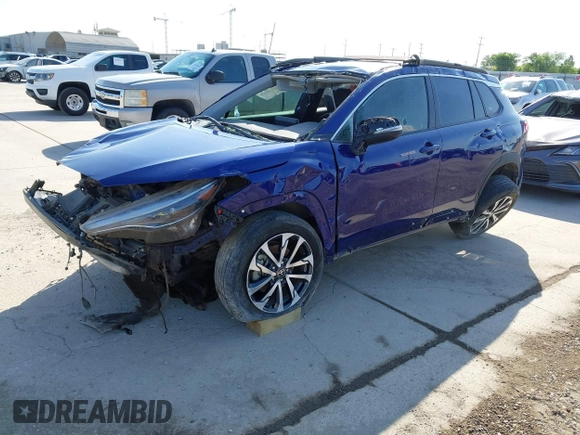 2022 Toyota Corolla Cross XLE with VIN 7MUDAAAG8NV027585, listed as a IAAI auction lot 41781177 with 36,841 mi miles and . Bid and sale history available at DreamBid. Image 2.