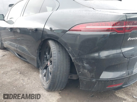 2020 Jaguar I-Pace SE with VIN SADHC2S14L1F80256, listed as a IAAI auction lot 42055674 with 48,694 mi miles and . Bid and sale history available at DreamBid. Image 6.