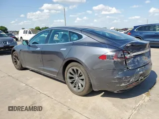2018 Tesla Model S 75D с VIN 5YJSA1E21JF260383, выставлен на аукционе Copart как лот 61927665 с пробегом 74 644 миль миль и Списание • Salvage title. История ставок и продаж доступна на DreamBid. Изображение 2.