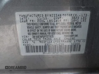 2015 Nissan Sentra S with VIN 3N1AB7AP5FY377475, listed as a IAAI auction lot 41157865 with 131,119 mi miles. Bid and sale history available at carsss.com. Image 9.