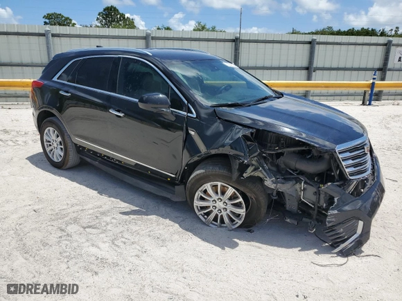 2019 Cadillac XT5 FWD with VIN 1GYKNARS9KZ219259, listed as a Copart auction lot 53243354 with 58,739 mi miles and Non Repairable. Bid and sale history available at carsss.com. Image 4.