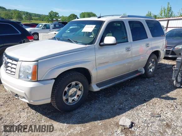 2005 Cadillac Escalade z VIN 1GYEC63N65R243624, wystawiony jako IAAI lot #42161106 z przebiegiem 150 877 mil mil oraz . Historia ofert i sprzedaży dostępna na DreamBid. Obrazek 2.