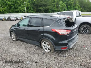2014 Ford Escape SE with VIN 1FMCU9GX7EUB52765, listed as a Copart auction lot 57563305 with 187,203 mi miles and Salvage title. Bid and sale history available at DreamBid. Image 2.
