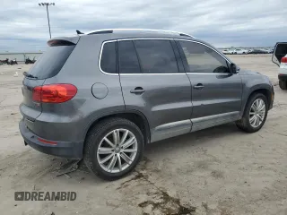 2015 Volkswagen Tiguan R-Line z VIN WVGAV7AX7FW515931, wystawiony jako Copart lot #52606635 z przebiegiem 127 391 mil mil oraz Czysty tytuł • Clean title. Historia ofert i sprzedaży dostępna na DreamBid. Obrazek 3.