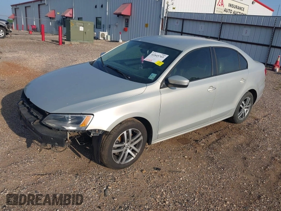 2011 Volkswagen Jetta Sedan SE w/Convenience & Sunroof with VIN 3VWDX7AJ5BM322367, listed as a IAAI auction lot 41845769 with 147,262 mi miles. Bid and sale history available at carsss.com. Image 2.