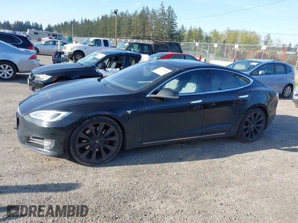 2018 Tesla Model S 75D with VIN 5YJSA1E28JF273809, listed as a IAAI auction lot 42029434 with 85,972 mi miles and . Bid and sale history available at DreamBid. Image 14.