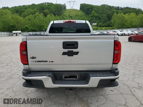 2018 Chevrolet Colorado 4WD Work Truck with VIN 1GCHTBEN2J1208385, listed as a Copart auction lot 57336815 with 136,098 mi miles and Salvage title. Bid and sale history available at DreamBid. Image 6.