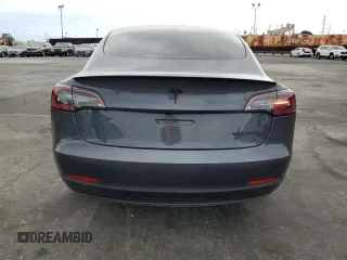 2023 Tesla Model 3 с VIN 5YJ3E1EA4PF409796, выставлен на аукционе Copart как лот 54202465 с пробегом 45 275 миль миль и Списание • Salvage title. История ставок и продаж доступна на DreamBid. Изображение 6.