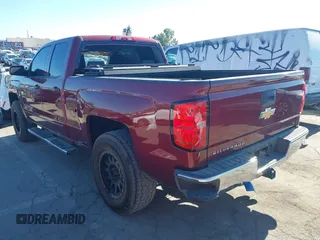 2017 Chevrolet Silverado 1500 LT with VIN 1GCRCREC0HZ171084, listed as a IAAI auction lot 40142848 with 137,420 mi miles and . Bid and sale history available at DreamBid. Image 3.
