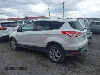 2015 Ford Escape Titanium with VIN 1FMCU0J99FUB92563, listed as a IAAI auction lot 42649556 with 183,199 mi miles and . Bid and sale history available at DreamBid. Image 14.