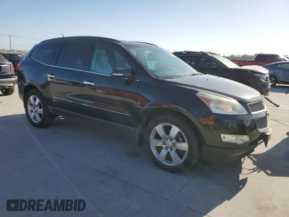 2012 Chevrolet Traverse LTZ z VIN 1GNKRLED7CJ261692, wystawiony jako Copart lot #49294845 z przebiegiem 207 616 mil mil oraz Czysty tytuł • Clean title. Historia ofert i sprzedaży dostępna na DreamBid. Obrazek 4.