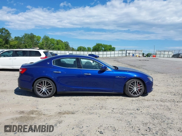 2015 Maserati Ghibli S Q4 with VIN ZAM57RTA1F1144312, listed as a IAAI auction lot 42336740 with 64,897 mi miles and . Bid and sale history available at DreamBid. Image 13.